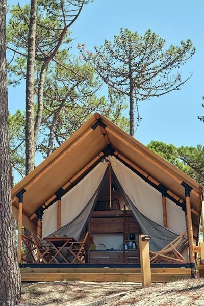 Luxury glamping tent in forest.